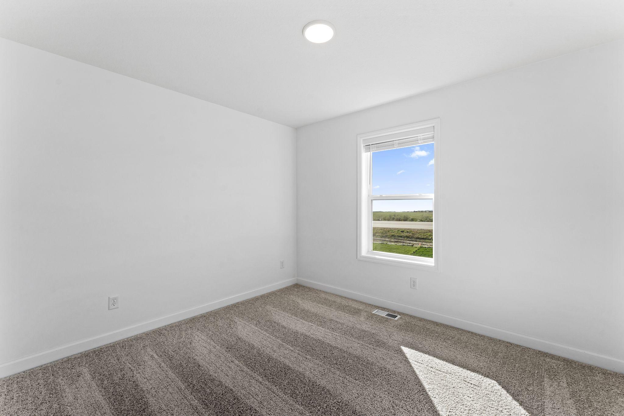 The secondary bedrooms offer comfort and privacy.