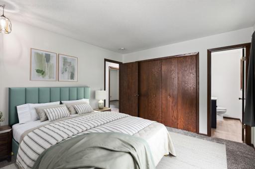 Primary bedroom with attached 1/2 Bath