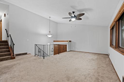 Newer carpet throughout main living areas, upstairs and down.