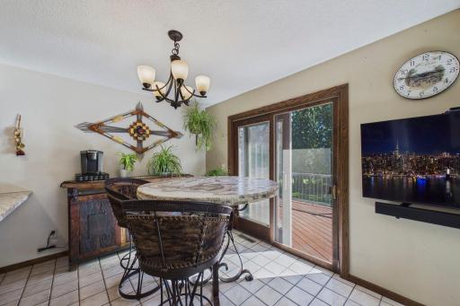 spacious dining room next to the deck for grilling