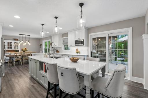 Generous center island with seating offers plenty of space for casual meals and conversation.