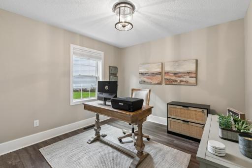 The main floor also offers a flexible room that can serve as an office, bedroom, study, or other space to fit your needs.