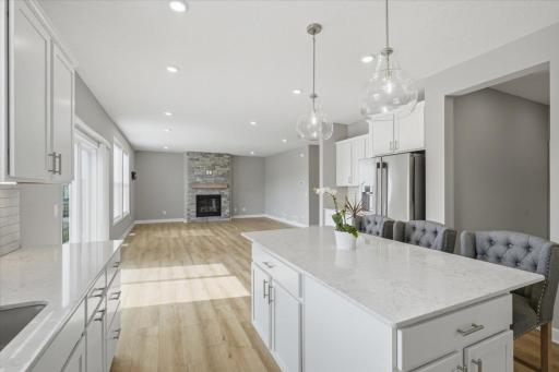 The open concept kitchen and living room creates a seamless flow making it easy to cook, gather and entertain.
