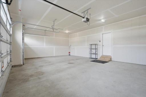 Spacious 3 car garage offering plenty of room for vehicles, storage and everyday essentials.
