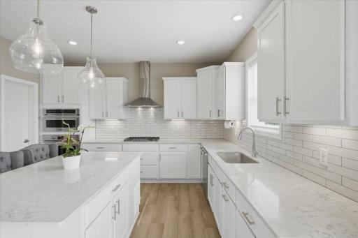 Beautiful granite countertops and large center island, lots of counter space and storage.