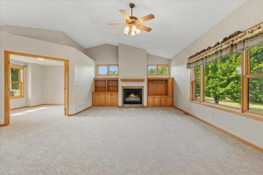 Main Lvl Living Room with Built in and gas Fireplace.