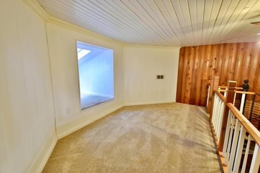 Unique loft space. A reading nook or office space?