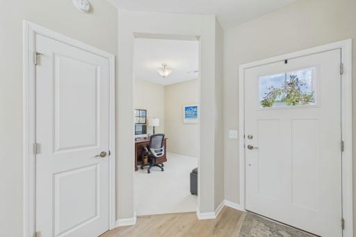 Off of entryway, front office flex room, could easily be set up as a 3rd bedroom, front coat closet, neutral decor, upgraded flooring.