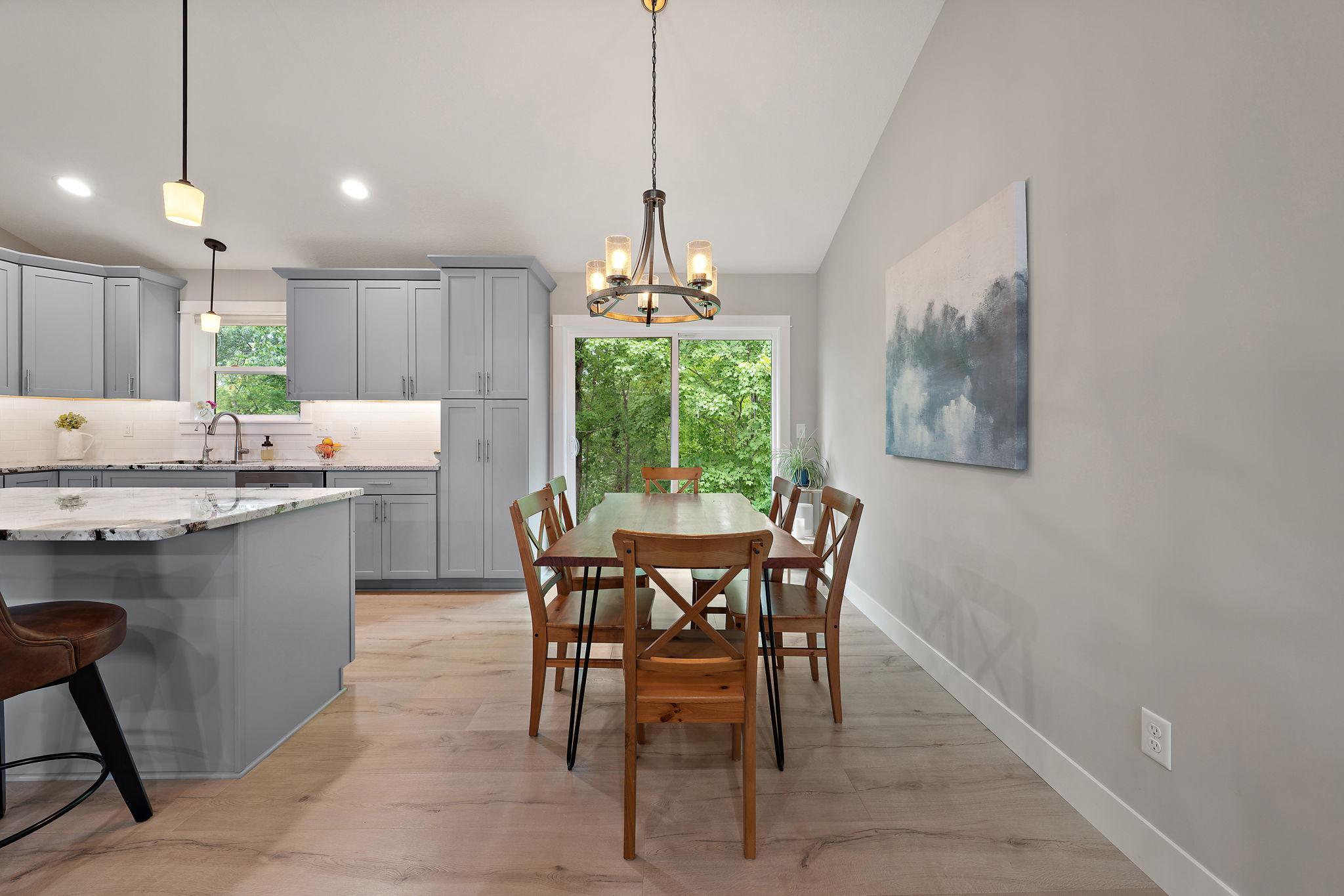 The dining area is right off of the kitchen and a patio door faces the back lot and offers an opportunity for a deck to be built if a new homeowner desires one.