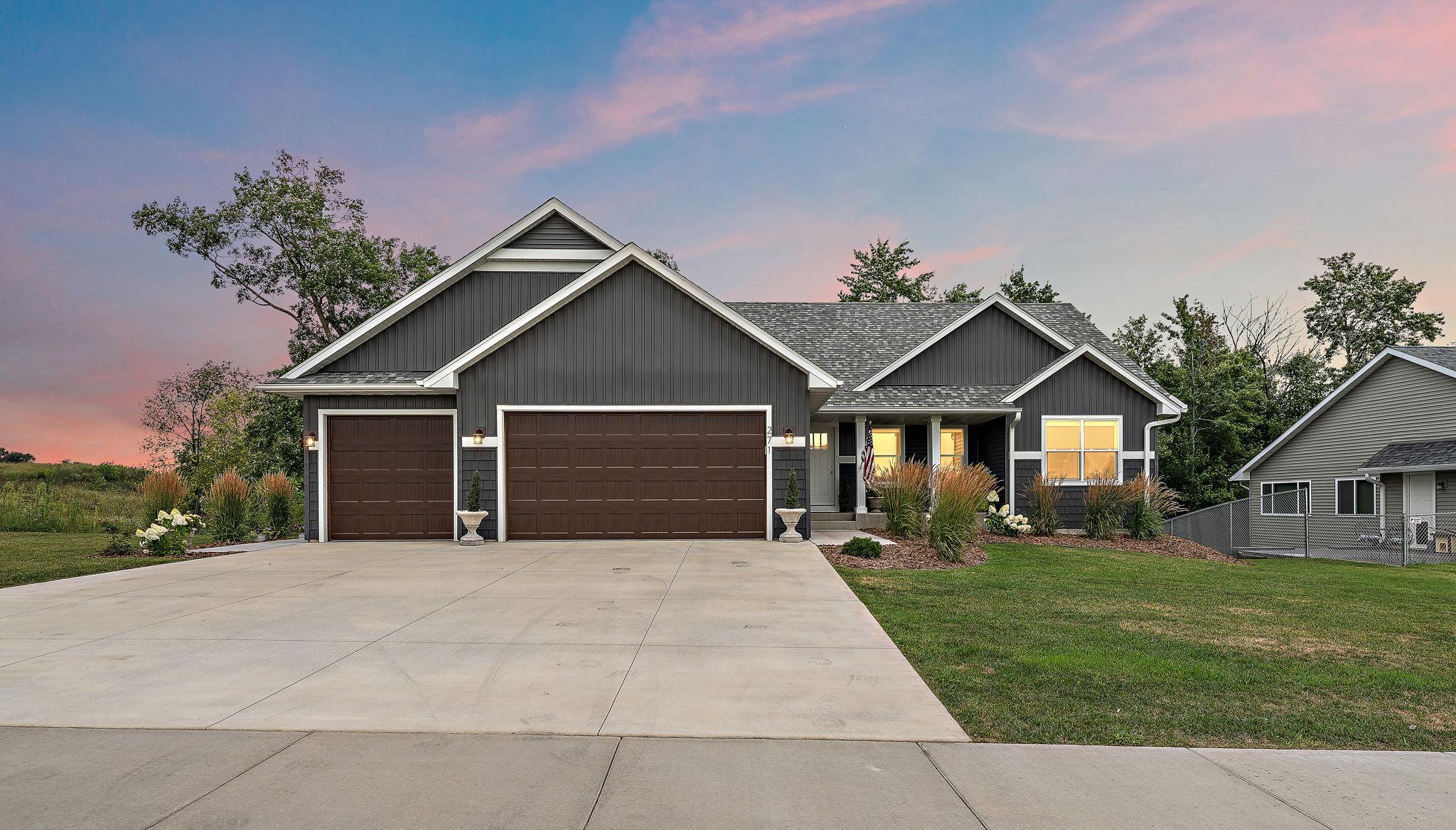 Twilight view of the front of the home.