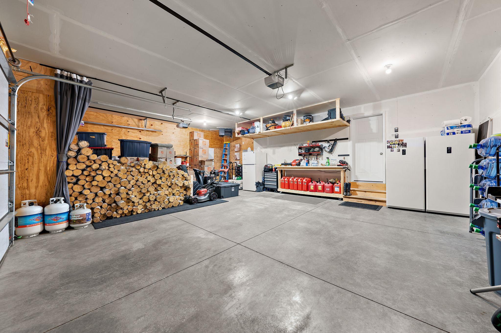 The garage is heated and insulated with plywood walls.