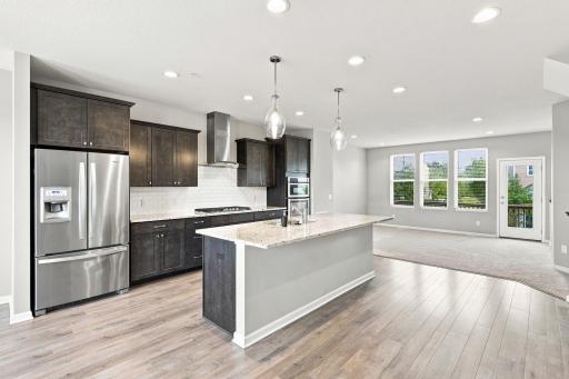 5140 Hampton St NE - the main level is totally open and spacious, flowing from the living room to the kitchen to the dining area
