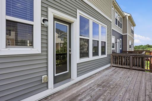 5140 Hampton St NE - The east-facing balcony is shaded in the afternoons/evenings, and will easily accommodate multiple furniture pieces and a grill