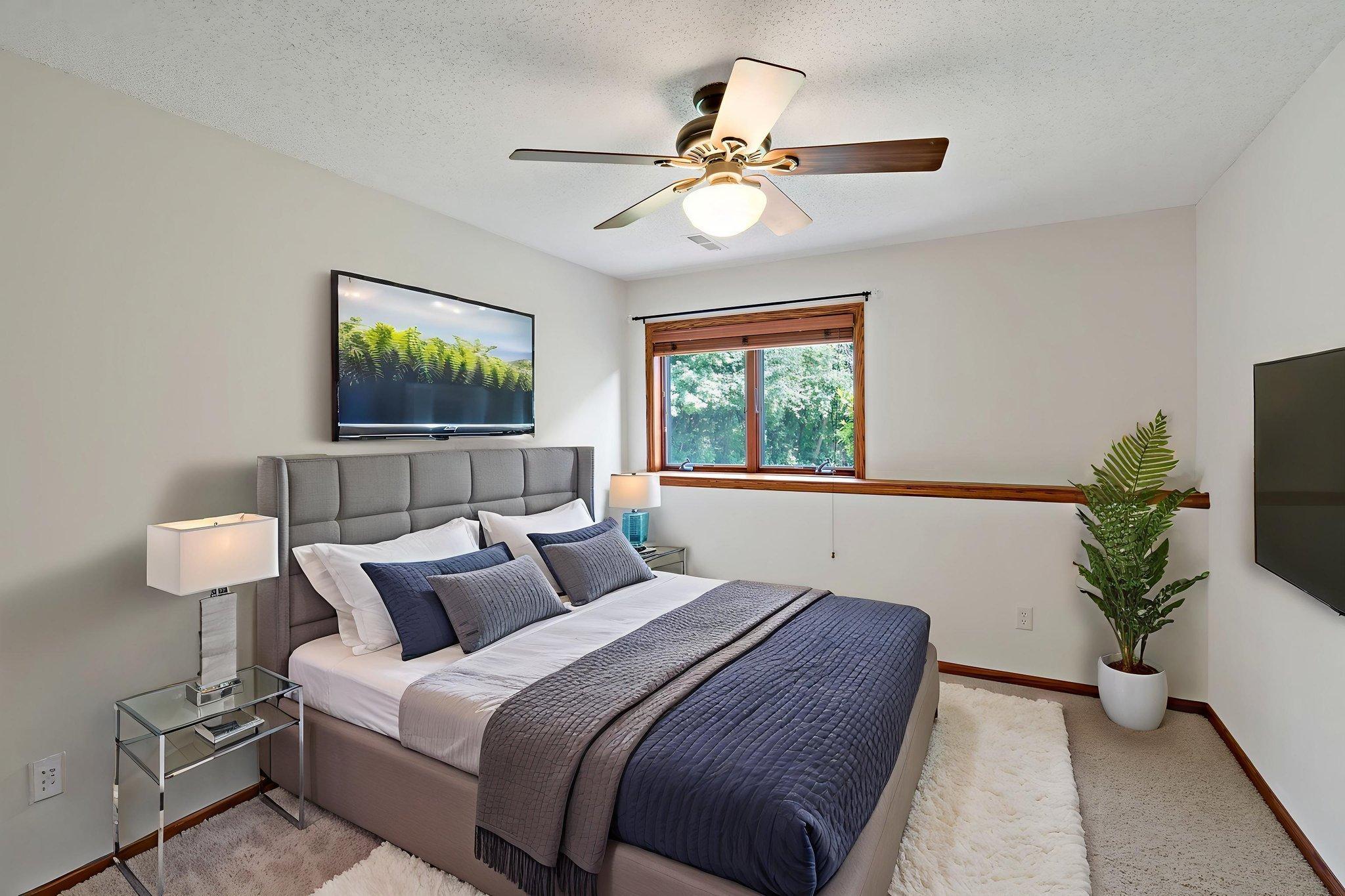 This photo is virtually staged. Lower level 3rd bed