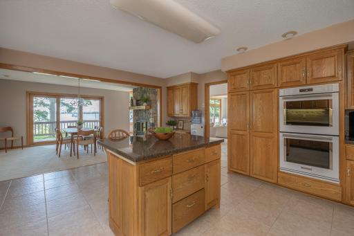 Open kitchen with newer custom appliances.