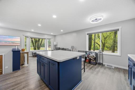 Large center island with ample space for storage, meal prep and seating.