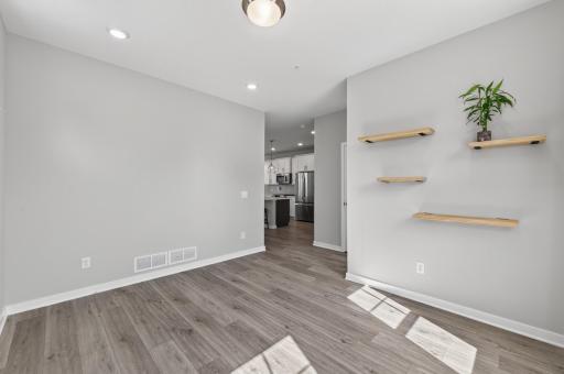 Main level bonus room has tons of natural light flowing through!