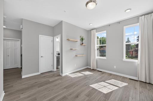 Main level bonus room has tons of natural light flowing through!