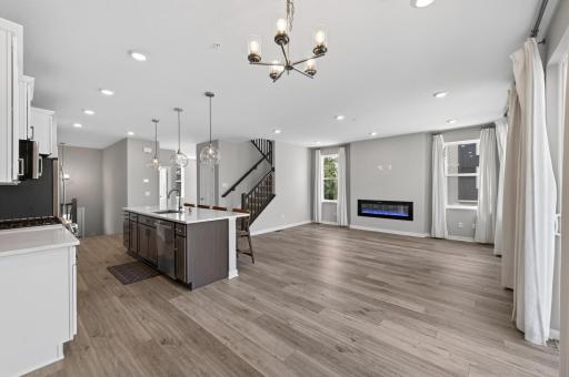 Kitchen area with views of the living and dining room areas