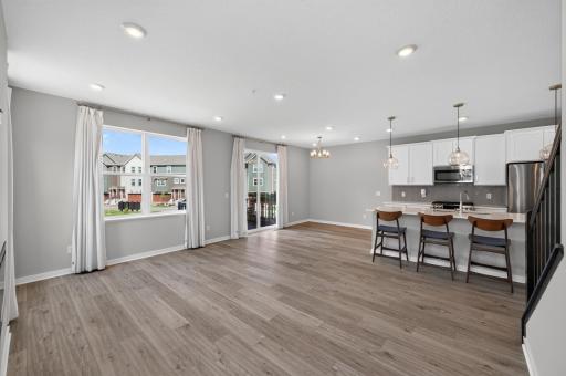 Living room, dining room, and kitchen areas