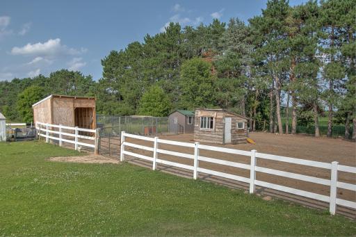 Several outbuildings currently home to several farm animals.