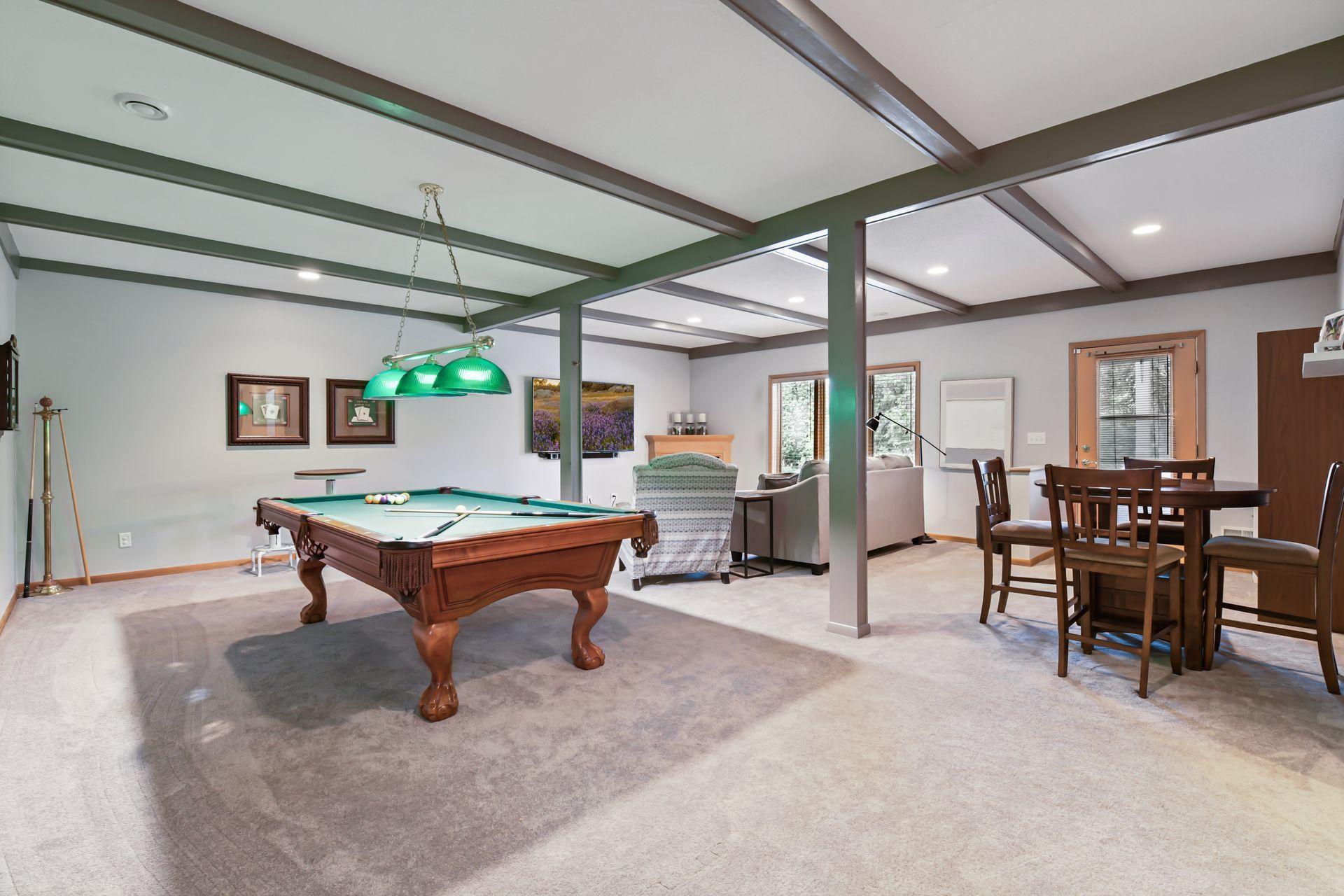 The walkout lower level, featuring new carpet throughout, provides exceptional additional living and entertaining space.