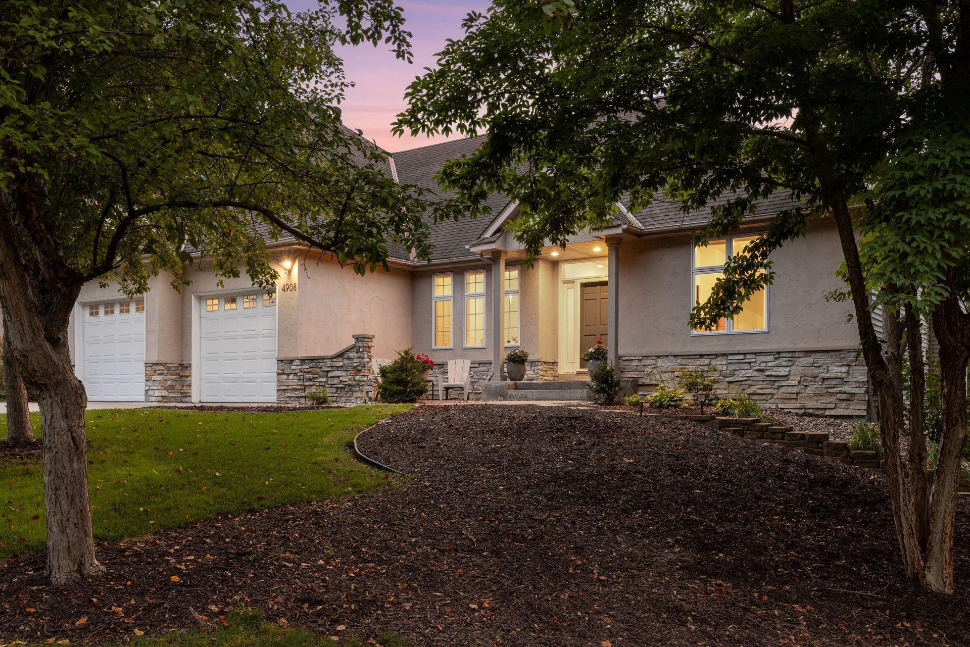 Welcome to 4908 Malibu Drive, a lovely executive home in Edina offering the space and privacy of a single-family home with the ease of twin-home living—and no HOA fees.