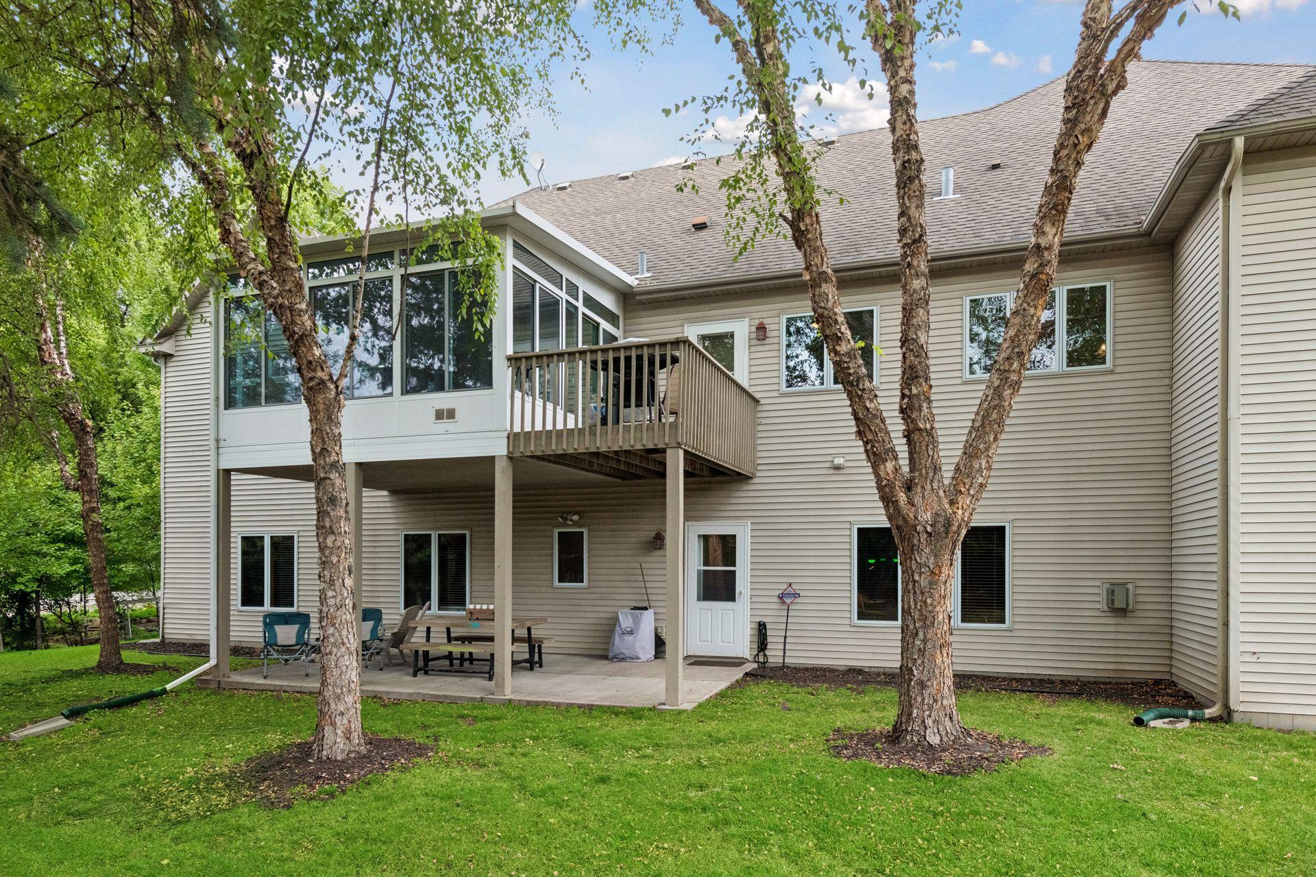 A walkout patio and fire-pit area offer yet another inviting place to relax, entertain and enjoy the peaceful setting.