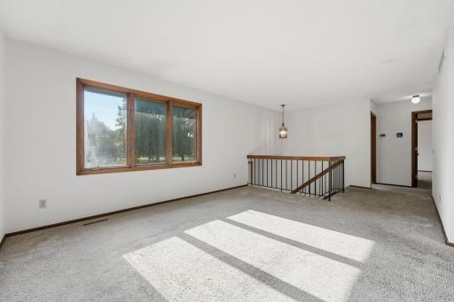 Imagine slow Sunday mornings, cozy nights on the couch, and a house full of friends and family. With wonderful natural light and plenty of room to gather, this inviting living room is ready for all of it.