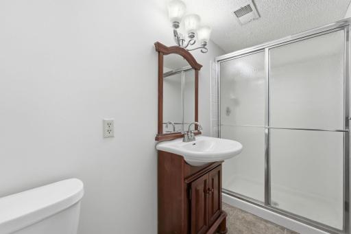 An additional bathroom means a little more breathing room for everyone! The walk-in shower and vanity storage make this a convenient space for family members, overnight guests, or busy mornings.