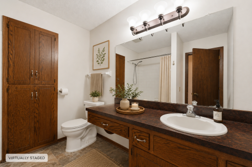 Busy mornings just got easier! The expansive vanity provides plenty of countertop and storage space for getting ready for the day, while the tub/shower combination adds everyday convenience.