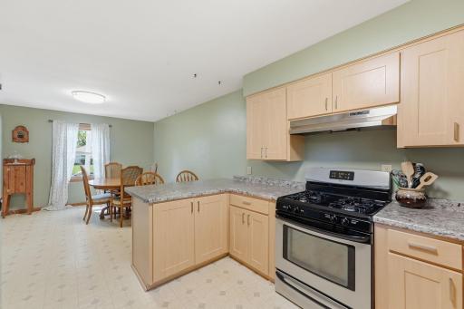 The kitchen flows into a dedicated dining room, making entertaining and family meals a breeze