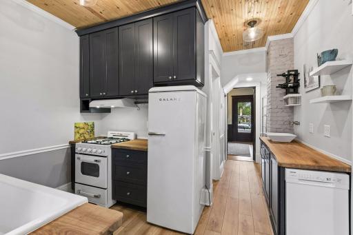 Super fun kitchen design with a separate fridge and freezer!