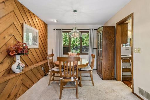 Cozy informal dining room with natural views