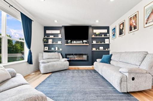 Family Room with fireplace and custom shelving