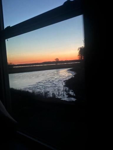 Sunrise views from primary bedroom windows