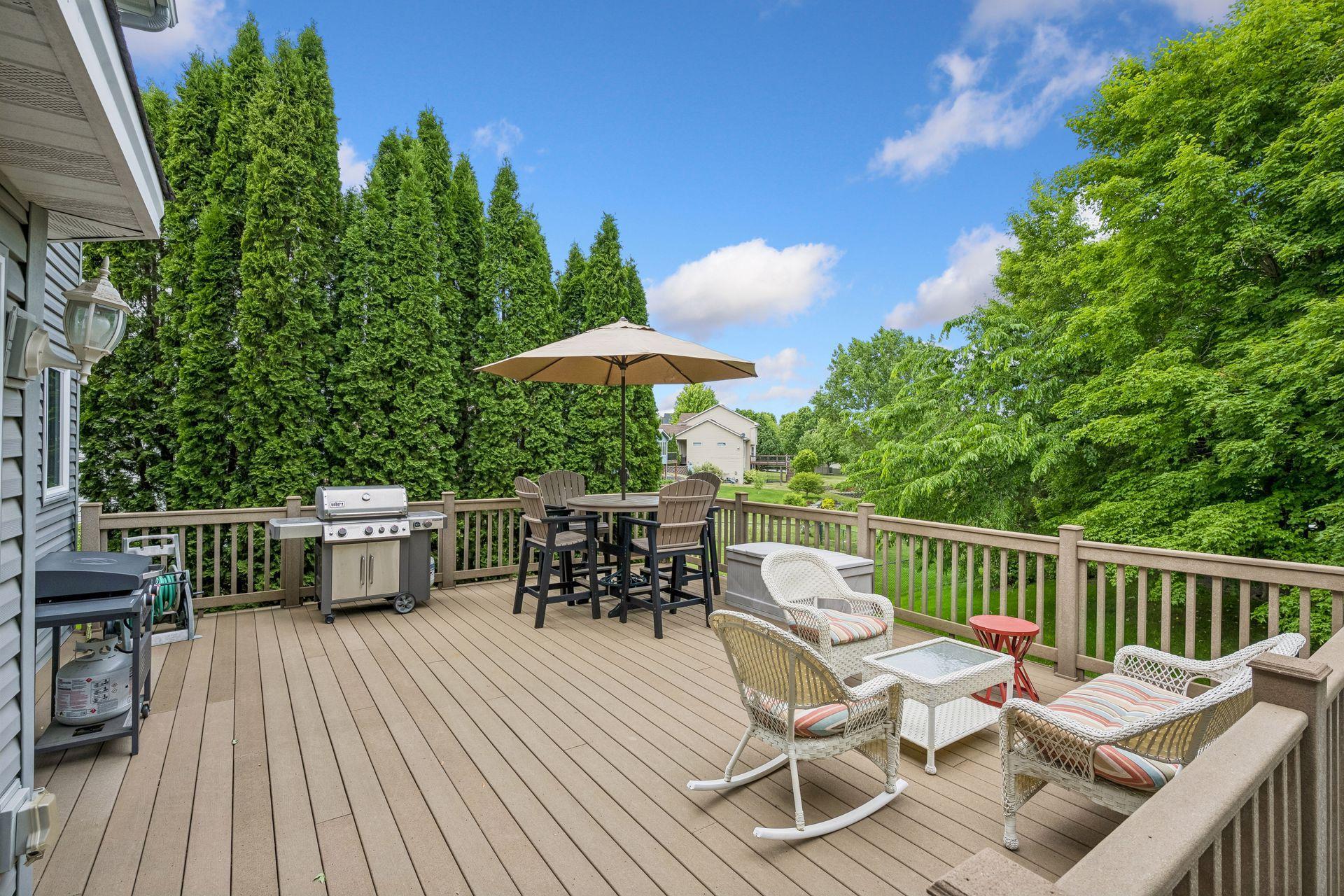 Maintenance Free deck overlooking almost 1/2 acre