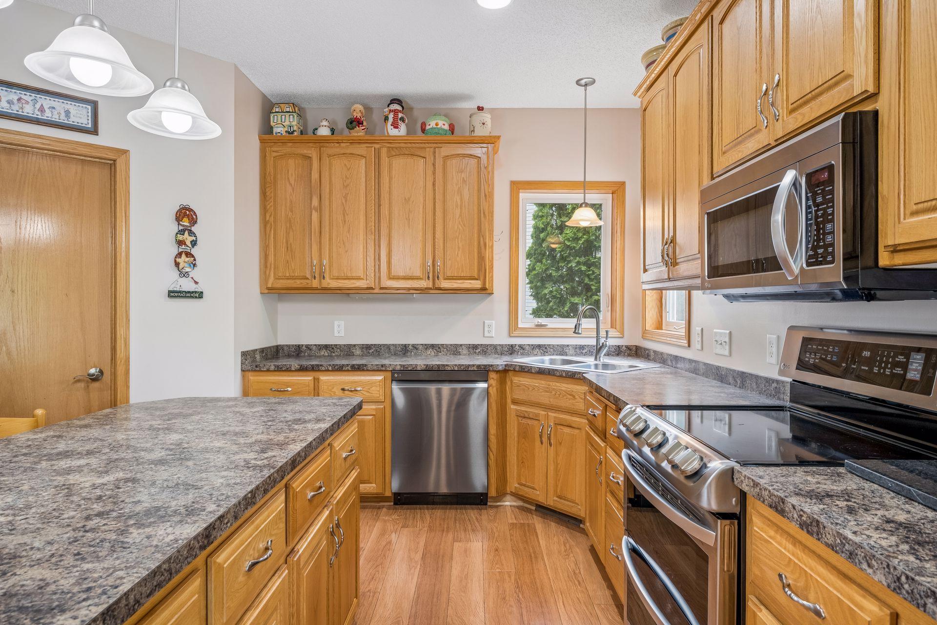 Kitchen with Window and Stainless Steel Appliances
