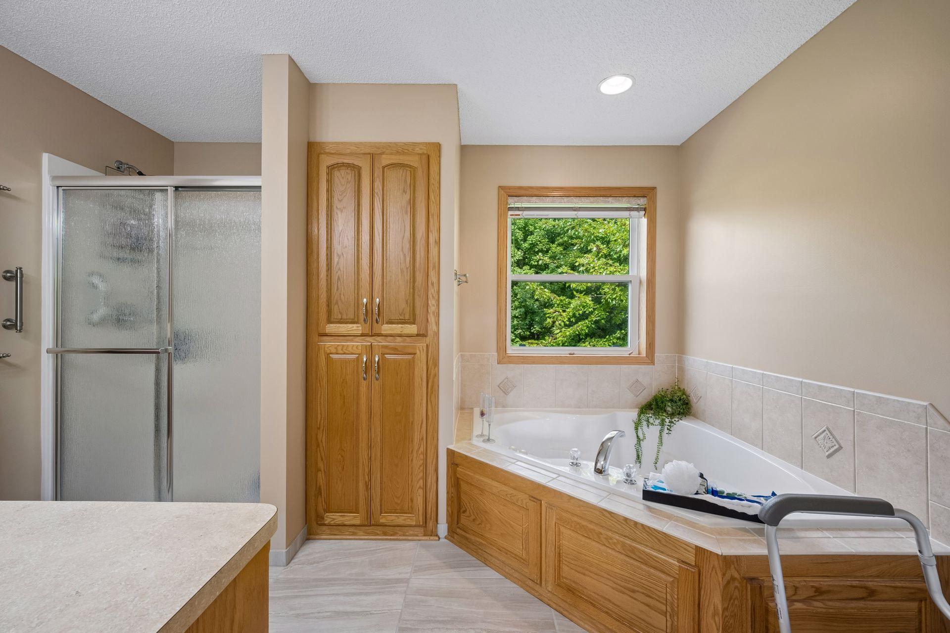 Primary Bathroom with whirlpool tub
