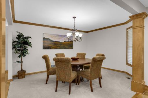 Spacious dining area with plenty of room for larger gatherings, making it perfect for hosting family and friends.