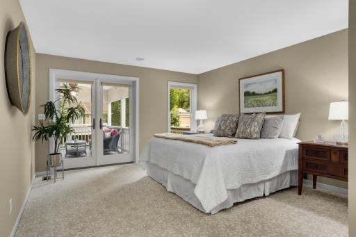 Ownerâs suite with direct access to the inviting screened-in porchâperfect for enjoying the peaceful outdoors