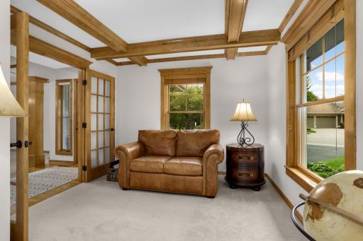 The den is a wonderful extension of the office, offering additional space and flexibility.