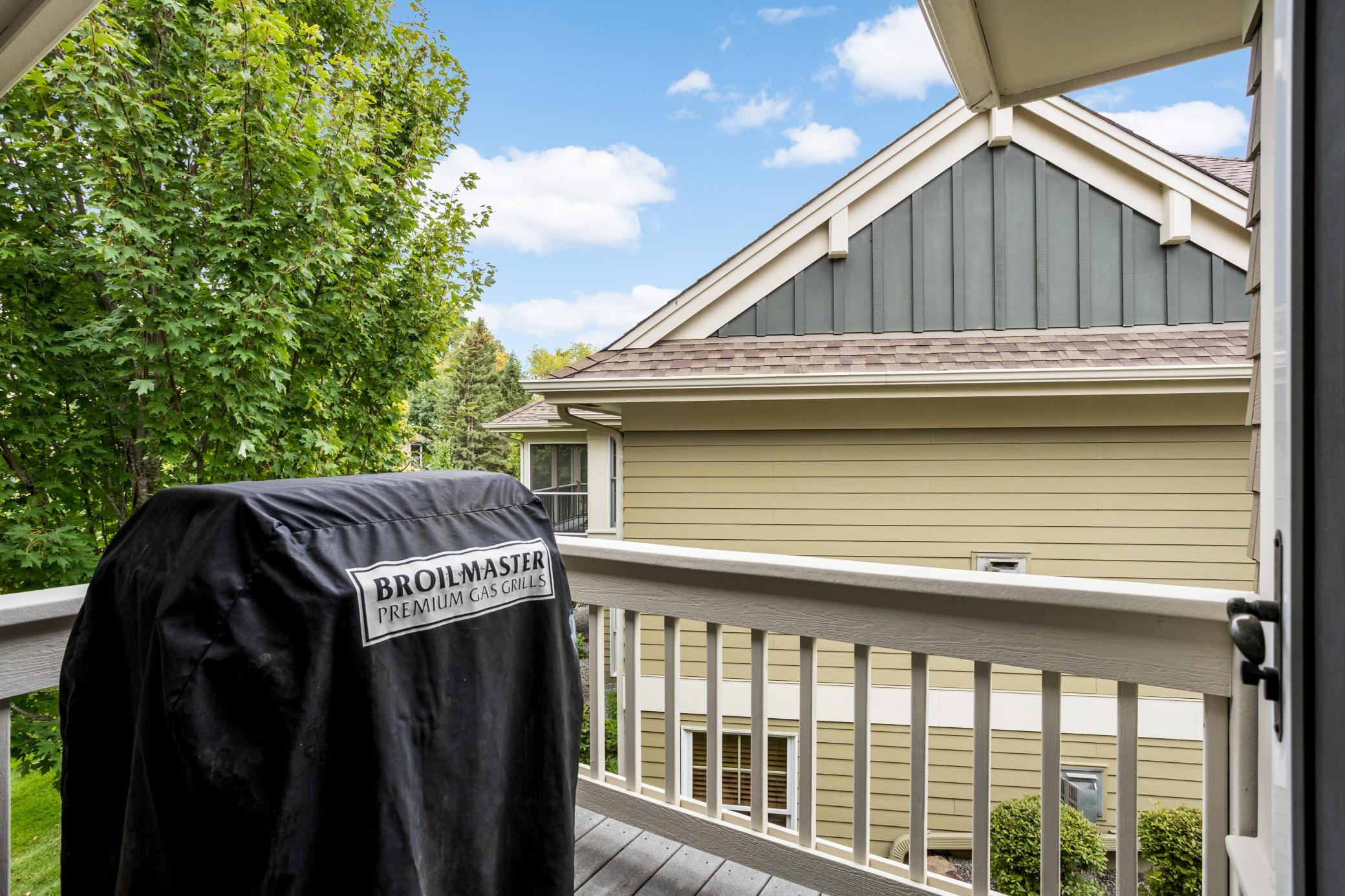Thoughtfully designed for safety, the grill is located on its own separate deck, away from the main screened-in porch.