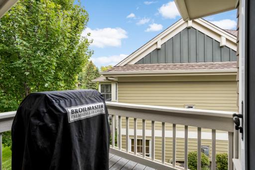 Thoughtfully designed for safety, the grill is located on its own separate deck, away from the main screened-in porch.
