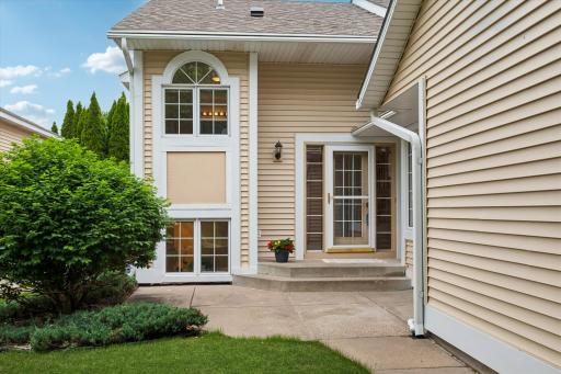 Engaging front elevation - nice to have a private patio!