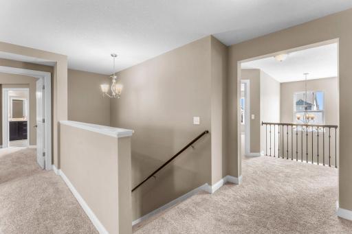 Top of the stairway to 4 bedrooms + bonus area.