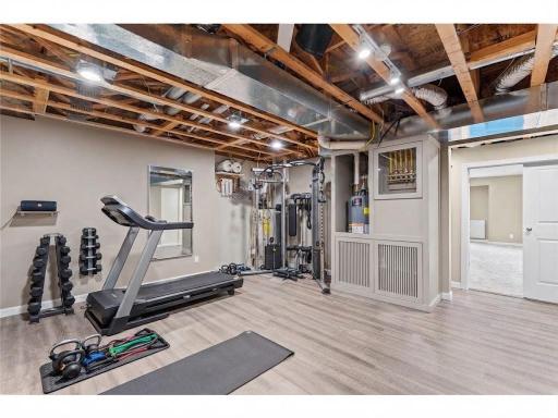 The utility room could double as a home exercise center. Virtually staged.