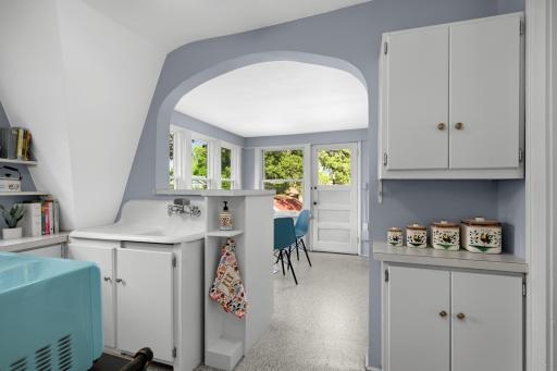 Charming sink and sunroom-like windows. Perfect space to work from home, paint, enjoy coffee....