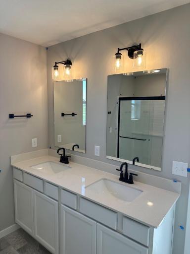 Two Sinks in primary bath, along with a window! in a similar Duncan end home