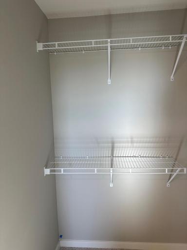 The second of two walk in closets in the primary in a similar Duncan end home